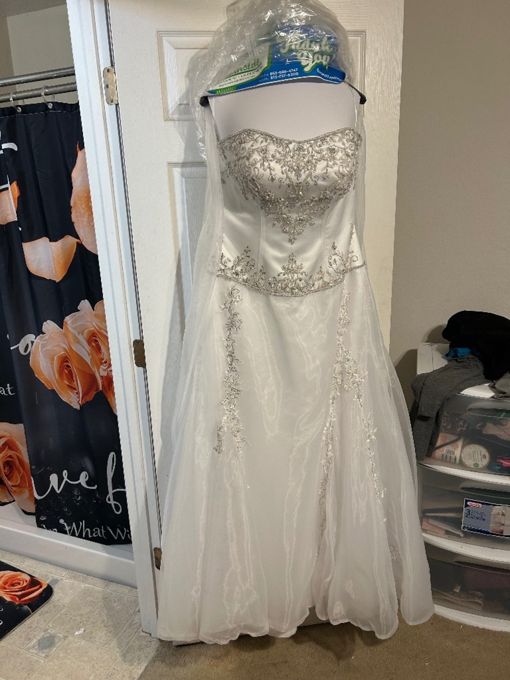 Gently used recently dry cleaned wedding dress